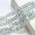 Iridescent 6x9mm teardrop glass crystal beads for DIY jewelry and earring making - 100 Pcs/Pack / Transparent Green