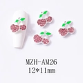 Vista detallada de dijes 3D de cereza para uñas con cristales rosas y esmalte verde - Base de Plata Cereza Rosa Grande (AM26)