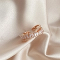 Detail of rose gold double-layered open ring with baguette zircon on silk fabric - Rose Gold Copper Zircon (FSRP222C)