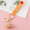 3D football keychain with orange Good Luck wrist strap and gold lobster clasp souvenir - Gold Strap Style-Rugby