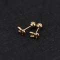 Detailed close-up of golden rabbit stud earrings with secure ball screw back closure - Rabbit / Gold