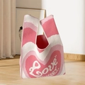 Pink heart-patterned knit wrist bag with Betsey text and soft cotton texture - Pink-Hearts