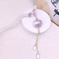 Elegant purple flower hair stick with golden tassels and white acetate ring design - Purple