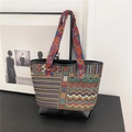 Ethnic style canvas tote bag featuring geometric woven patterns and black leather trim - Black Stripe