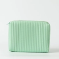 Detail view of mint green quilted leather makeup bag with vertical stitching and zipper - Light Green
