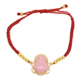 Detail of red braided rope bracelet with pink Buddha pendant and sparkling zircon accents - Pink