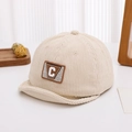 Detail of baby corduroy cap in beige with letter C patch and soft rolled brim texture - 48-50cm (8 Months - 2 Years Old) / Letter C-Cream White