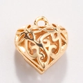 Detailed macro view of heart-shaped hollow golden charm with intricate floral patterns - Style 10-Hollow Heart