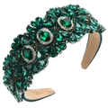 Dettaglio del cerchietto barocco con strass smeraldo e fodera in scamosciato beige - Verde