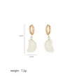 Close-up of crescent moon earrings with natural stone dangles and gold hoop details - White Texture Crescent Earrings (A2-13-Earrings)