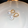 Elegant gold drop earrings featuring large white pearls and sparkling pavé crystal accents - No 29 Gold Plated Gold