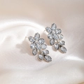 Elegant silver flower earrings with clear zircon crystals on champagne silk background - Flower Shape Full Diamond Pendant (E3332-3/Silver)