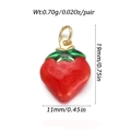 Detail showing red strawberry pendant charm with gold ring, 19mm height and 11mm width - 15-Large Red Strawberry