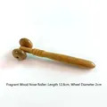 Handcrafted fragrant wood nose massager tool with dual wooden rollers and smooth handle - Scented Wood Small Nose Roller