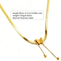 Golden stainless steel butterfly necklace with tassel showing size and weight specs - Butterfly Tassel Necklace / Gold