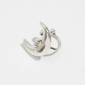 Macro detail of a silver moon face ear cuff featuring a vintage textured metal finish - Silver Moon Face Ear Cuff