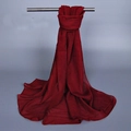 Deep red long chiffon scarf with lightweight texture hanging on a metal rod elegantly - 150x50cm / Burgundy