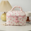 Quilted white cosmetic bag with pink bow pattern and pearl zipper charm - Large / White Pink