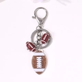 Portachiavi football americano marrone glitterato con chiusura a moschettone e ciondoli - Stile Football Americano Glitterato Oro