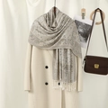 Detail of beige paisley scarf with fringe tassels styled over a minimalist autumn coat - VE018 White Camel