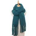 Detail of dark green mohair scarf with fringes on a wooden mannequin against white back - Malachite green