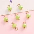 Light green 4mm faceted glass bead pendants with gold rings for DIY jewelry making - Green Round Bead