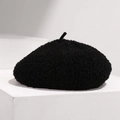 Close-up of black wool beret showing plush textured fabric on a white geometric stand - Adjustable / Black