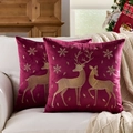 Burgundy velvet Christmas pillow covers with gold elk and snowflake embroidery on a sofa - Embroidered Gold Reindeer Wine Red Base/Wine Red