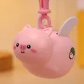 Pink cartoon flying pig keychain with white wings and cabbage motif detail - Pull-Line Flying Pig