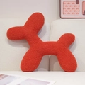 Vibrant orange-red balloon dog plush pillow in teddy fleece on a gray sofa - 50*40cm / Red
