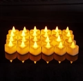 Set of 24 heart-shaped LED tea lights with warm yellow flame for romantic decor - Heart Shape LED Tea Lights 24Pcs Set