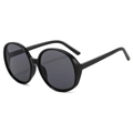 Classic round oversized sunglasses with black frame and dark lenses at a 45-degree angle - Sunglasses / Black Frame Black Grey Lens