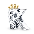 Close-up of letter K charm bead in 925 silver with a golden crown and sparkling zircons - Letter K
