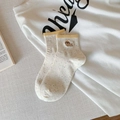 Calcetines blanco roto con motas de colores, puño amarillo acanalado y bordado de perro - Talla única / Amarillo