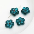 Macro detail of four blue glass flower beads with red centers and gold T-pin on white base - Large Flower (7#) / 1 Piece / Malachite green