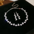 Luxury silver necklace and earrings set with brilliant white pearls and sparkling rhinestones - Pearl and Diamond Inlaid Bib Necklace Set / Silver