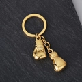 Detail of dual boxing glove charms on a gold-plated stainless steel keychain pendant - Gold Double Boxing Gloves Style (KY889-Z)
