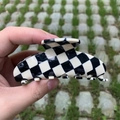Checkerboard pattern hair claw clip in black and white finish for stylish hairstyling - Black White Grid