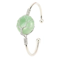 Detail of silver wire wrapped tree of life design on round green gemstone bangle - Silver+Aventurine