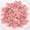 Close-up of pink and green acrylic tulip flower beads for DIY jewelry making accessories - 1 Piece / Pink
