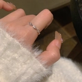 Silver pig nose link ring in chain style on model with a cozy winter sleeve - Pig Nose Chain Style (J4053)