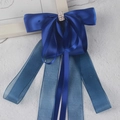 Dark blue satin bow hair clip with pearls, rhinestones and elegant flowing ribbons - Sapphire Blue