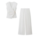 Elegant white sleeveless V-neck wrap top with metal buckle and wide-leg pants set - S / White