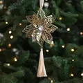 Golden hollow floral Christmas tree ornament with crystal center and beige tassel fringe - Gold Christmas Flower