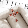 Luxurious silver cross pendant with red gemstones displayed in a beige velvet jewelry box - Pomegranate Red (配件049-3#)