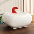 White ceramic pet water fountain with red gooseneck faucet on dark wood surface - Flowing Water Wealth [Red Top-White Bottom]