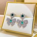 Silver bow and flower drop earrings featuring green and white crystal rhinestones - Silver Bow Black Stone