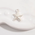 Detailed view of an S925 sterling silver starfish pendant with shimmering cubic zirconia - Silver Starfish Pendant