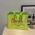 Grande borsa da spiaggia in rete verde neon con stampa Beach Vibes rossa - Giallo Con Scritte Rosse