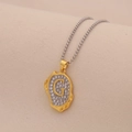 Macro view of gold letter G pendant necklace with pavé zircons on soft beige background - Letter G
